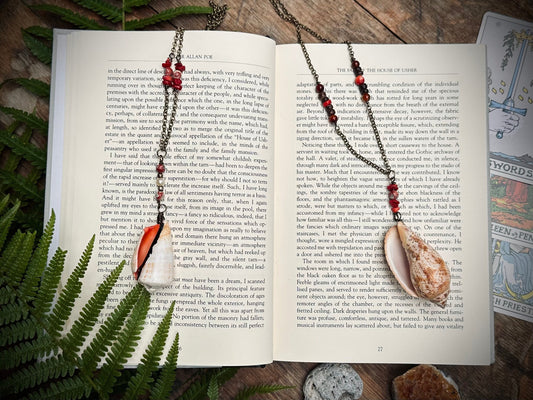 Handmade sea shell and charm necklace