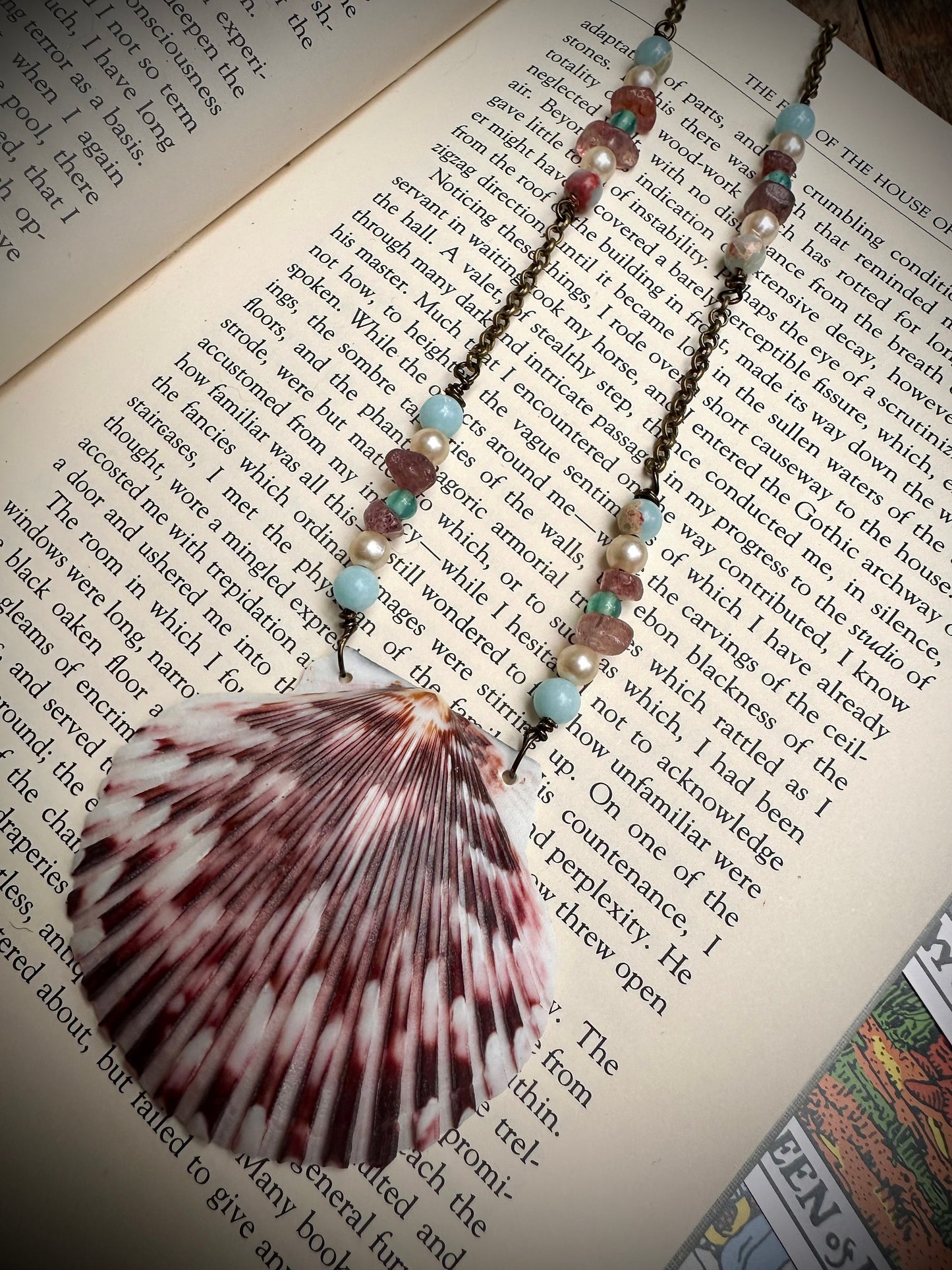 Handmade sea shell and charm necklace